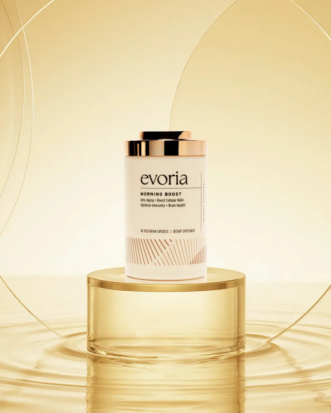 Evoria Morning Boost NAD+ supplement bottle with rose gold cap on gold pedestal